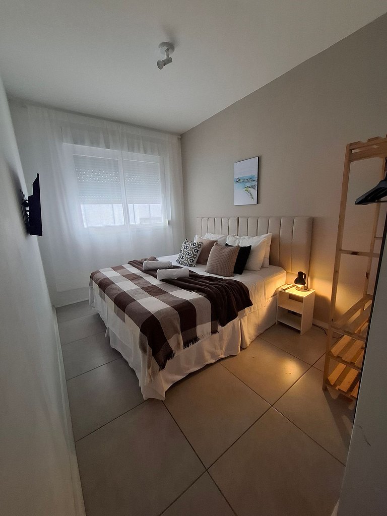 Localização Perfeita! Suítes Aconchegantes à Praia