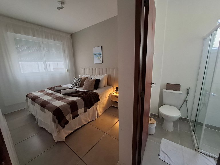 Localização Perfeita! Suítes Aconchegantes à Praia