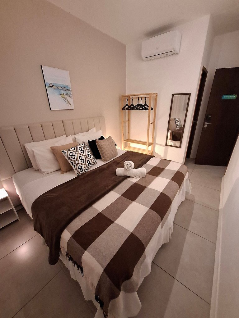 ¡Ubicación perfecta! Acogedoras suites junto a la playa.